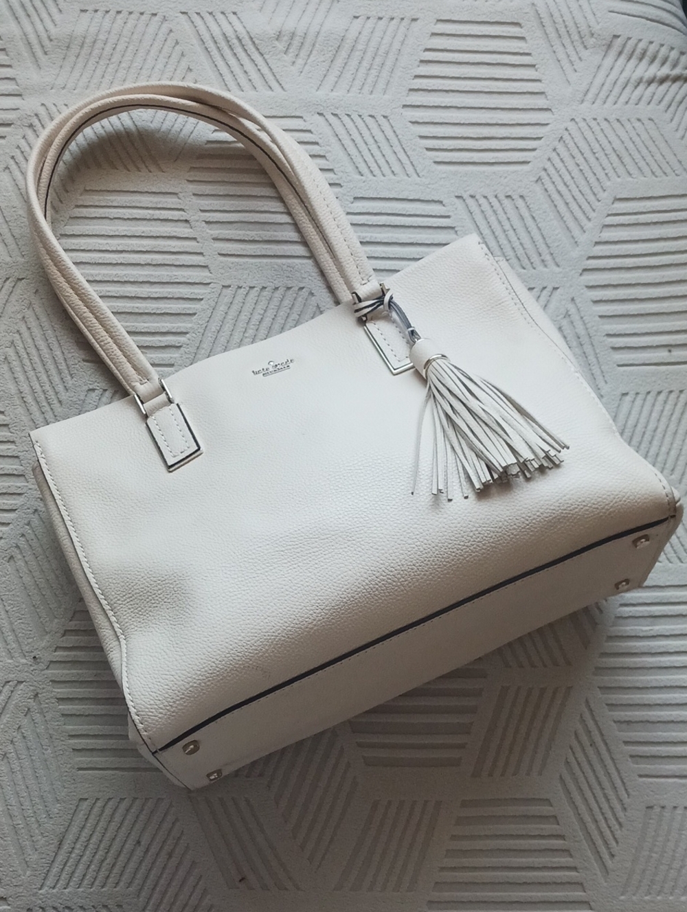 kate spade Naomi Pebbled Leather Tote with Tassel In Soft Limestone / Ivory